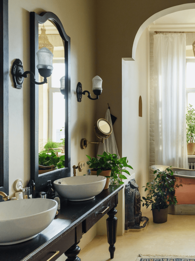 Stylish bathroom with classic washbasin and mirror.