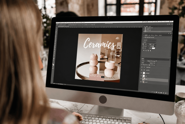 Designer creating social media visuals in Adobe Photoshop using AI-powered workflows for modern content marketing.
